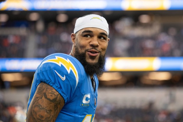 Los Angeles Chargers wide receiver Keenan Allen (13) chats before an NFL football game against the Chicago Bears, Sunday, Oct. 29, 2023, in Inglewood, Calif. (AP Photo/Kyusung Gong)