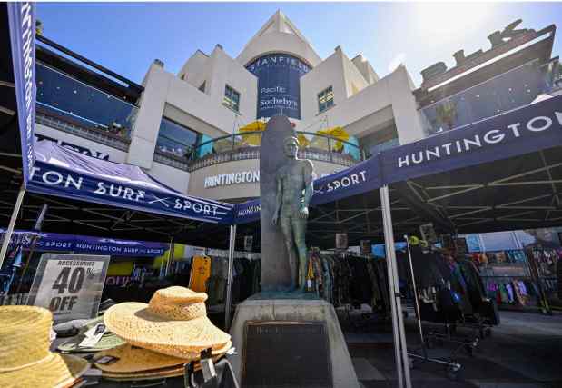 A Duke Kahanamoku statue stands at the corner of Pacific Coast Highway and Main Street in Huntington Beach, CA, on Tuesday, September 19, 2023. (Photo by Jeff Gritchen, Orange County Register/SCNG)