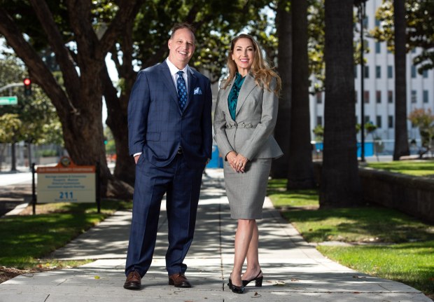 Attorneys Annee Della Donna and Eric Dubin, who are working with UCI law school students to exonerate people who have been wrongly convicted, stand together outside the Old Orange County Courthouse in Santa Ana on Wednesday, June 28, 2023. (Photo by Jeff Antenore, Contributing Photographer)