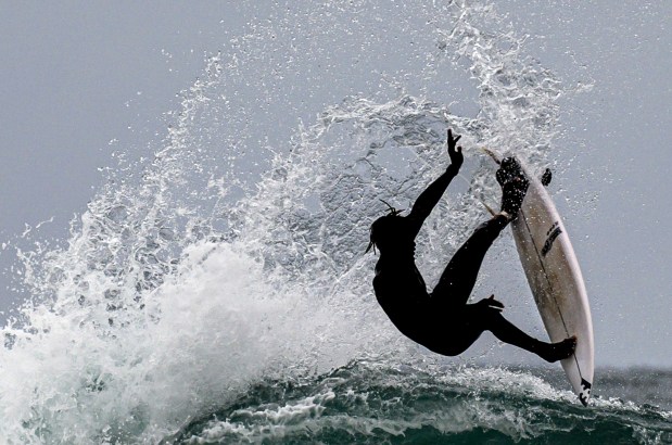 Cherif Fall goes vertical during the Great Day in the Stoke surfing event in Huntington Beach in 2022. Now in its 2nd year, the event is expected to be even bigger.(Photo by Mindy Schauer, Orange County Register/SCNG)
