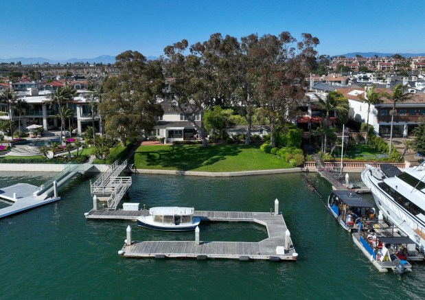 This Harbor Island home in Newport Beach has dropped its asking price to $64 million. (Photo by Jeff Gritchen, Orange County Register/SCNG)