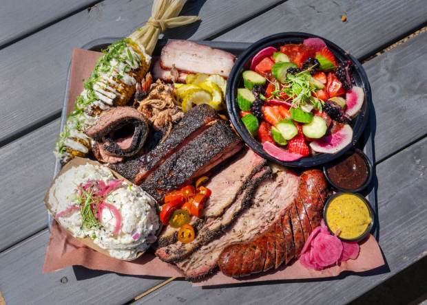 A platter with a variety of food served at Heritage Barbecue in San Juan Capistrano, on Wednesday, August 30, 2023. Heritage Barbecue celebrates three years in business. (Photo by Mark Rightmire, Orange County Register/SCNG)