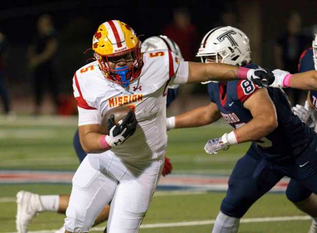 Mission Viejo running back Hinesward Lilomaiava gets through the Tesoro defense to pick up some yardage in a South Coast League football game in Las Flores on Friday, October 20, 2023. (Photo by Paul Rodriguez, Contributing Photographer)