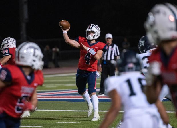 Tesoro quarterback Cash O'Byrne throws the ball during a nonleague game against Trabuco Hills on Friday, October 6, 2023. (Photo by Jeff Antenore, Contributing Photographer)