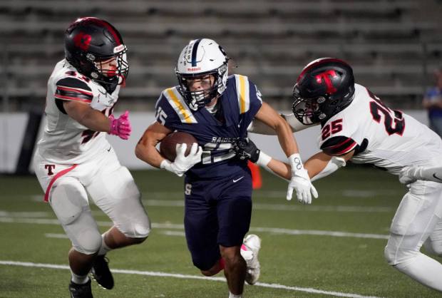 Sonora running back Anthony Abad hits a hole for positive yards in the game between Sonora vs. Troy in a Freeway League football game at La Habra High on Friday, October 20, 2023. (Photo by Michael Kitada, Contributing Photographer)