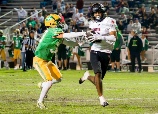 Marques Guzman (8) of Tustin breaks away from Kennedy's Gabriel Thomason (33) after catching a pass for a touch down in the second quarter during an Empire League football game at Western High School in Anaheim on Thursday, September 28, 2023. (Photo by Leonard Ortiz, Orange County Register/SCNG)