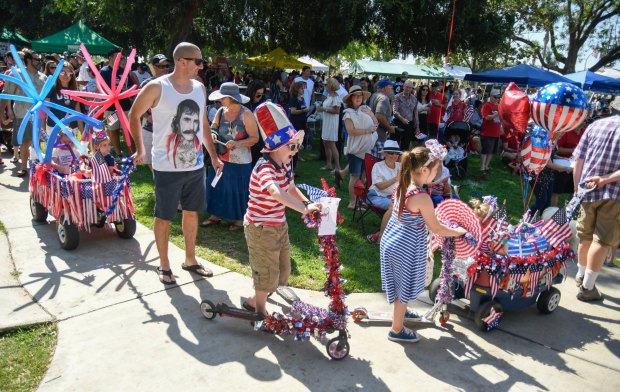 Participants make the first turn in front of the judges at the kiddie parade at the 38th Annual Country Fair on Tuesday, July 4, 2017 at City Hall Park in Brea.(Photo by Michael Kitada, Contributing Photographer)