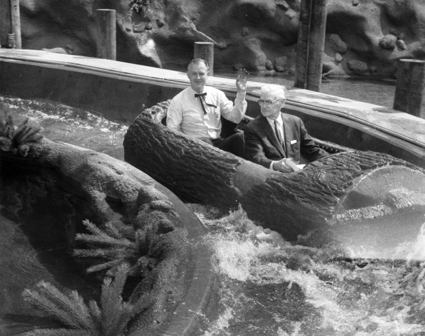 Walter Knott (in front) and ride designer, builder and operator "Bud" Hurlbut ride the Timber Mountain Log Ride at Knott's Berry Farm, in Buena Park in 1969. (Photo courtesy Orange County Archives)