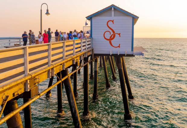 A giant SC painted on side the newly refurbished restrooms on San Clemente Pier was featured in the dedication ceremony in San Clemente in 2020. The wooden pier in San Clemente is celebrating its 95th birthday, a centerpiece of the small beach town. (Photo by Leonard Ortiz, Orange County Register/SCNG)