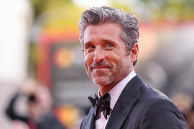 FILE – Patrick Dempsey poses for photographers upon arrival for...